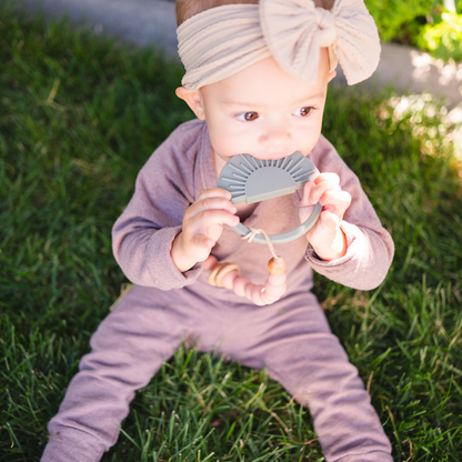 Light Rose Sunburst Teething Toy